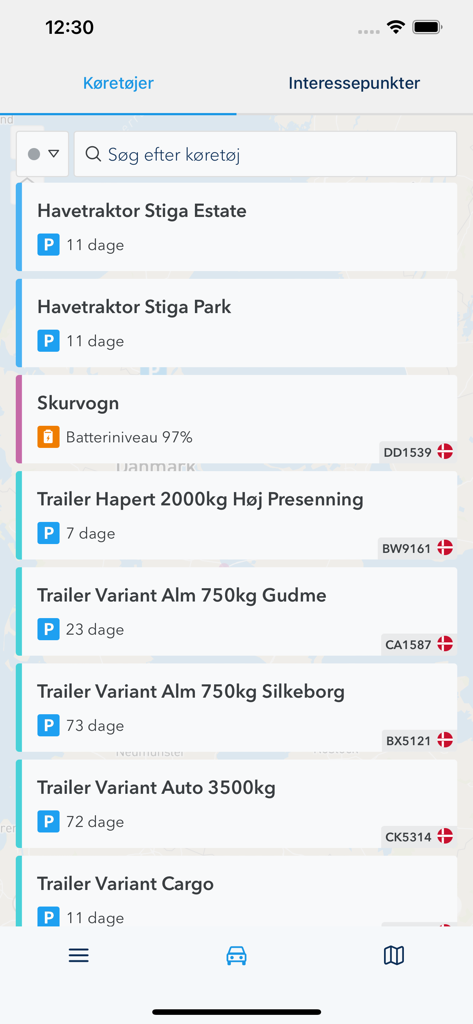 Keatech Live mobile app displaying a list of tracked vehicles and equipment with status and duration parked.