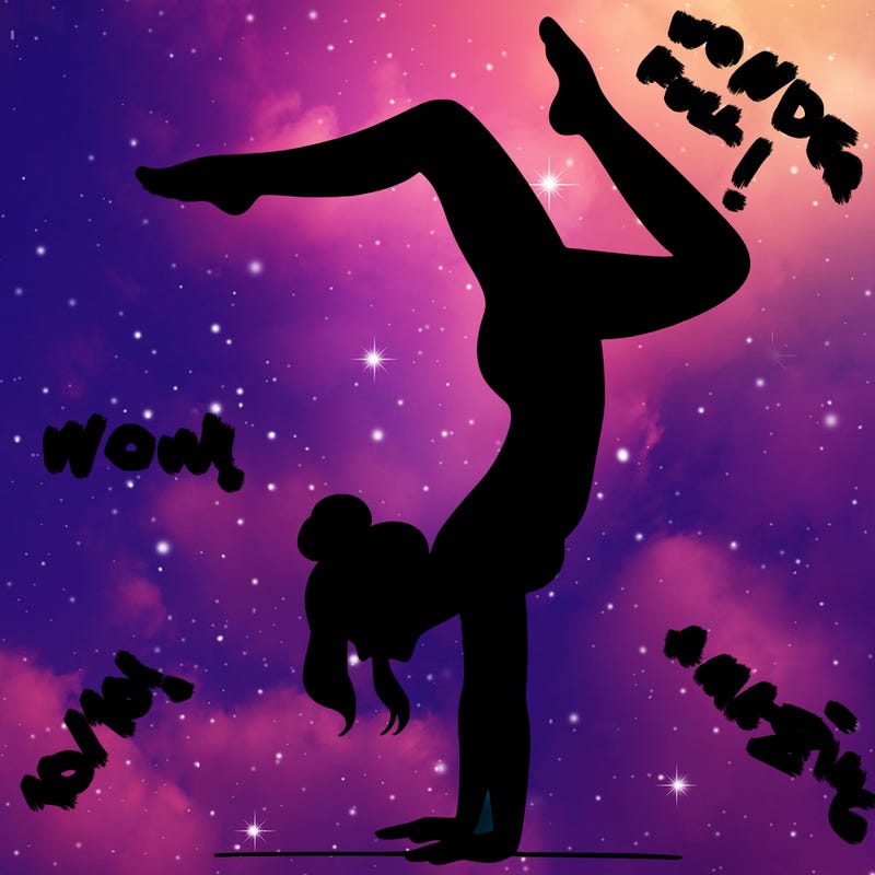 a woman doing a handstand