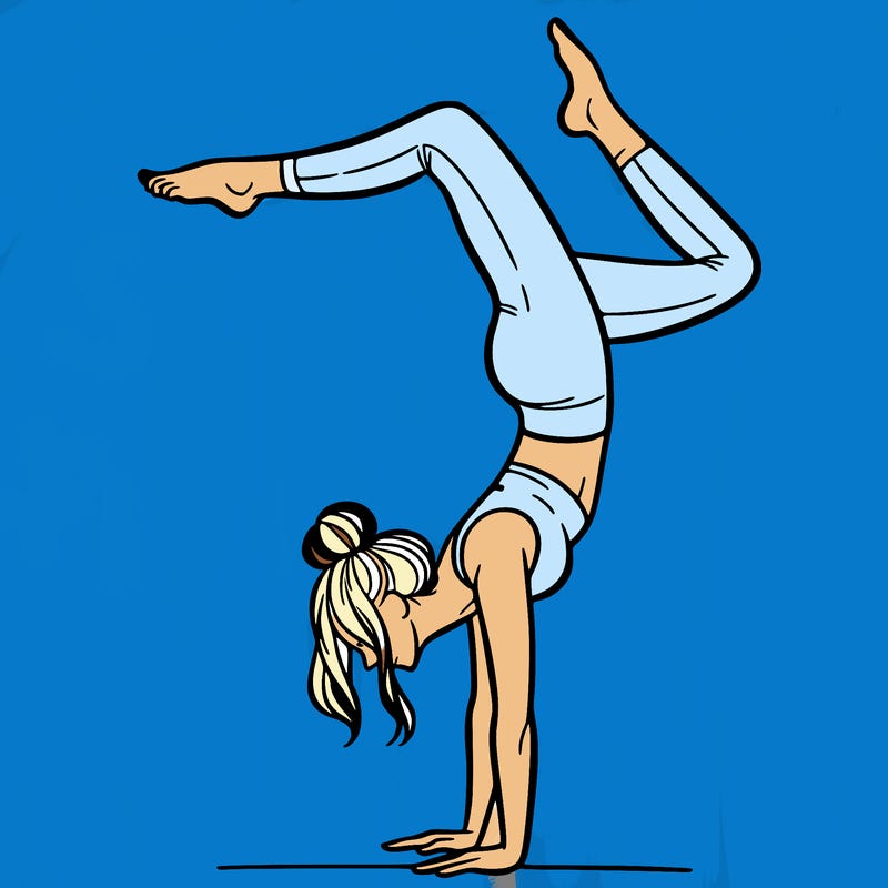 a woman doing a handstand