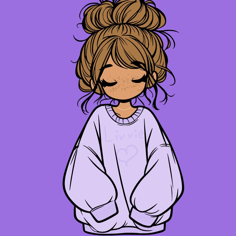girl with baggy sweatshirt and messy bun