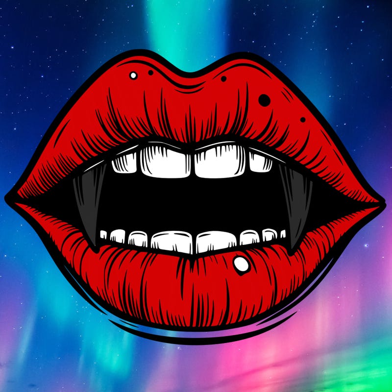 lips with vampire teeth