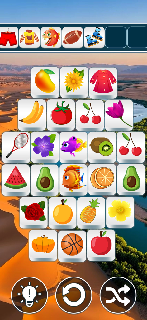 Sweet Fusion: Tile Match - Sweet Fusion Tile Matchのゲームプレイ画面、フルーツと花が描かれたカラフルなタイルが表示される