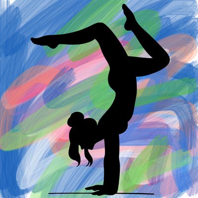 a woman doing a handstand