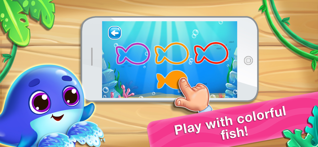 Games for learning colors 2 &4 - Un niño pequeño jugando un juego de emparejar colores de peces en un smartphone para el aprendizaje temprano