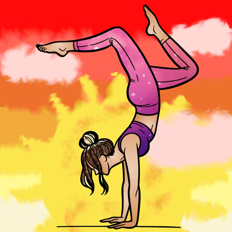 a woman doing a handstand