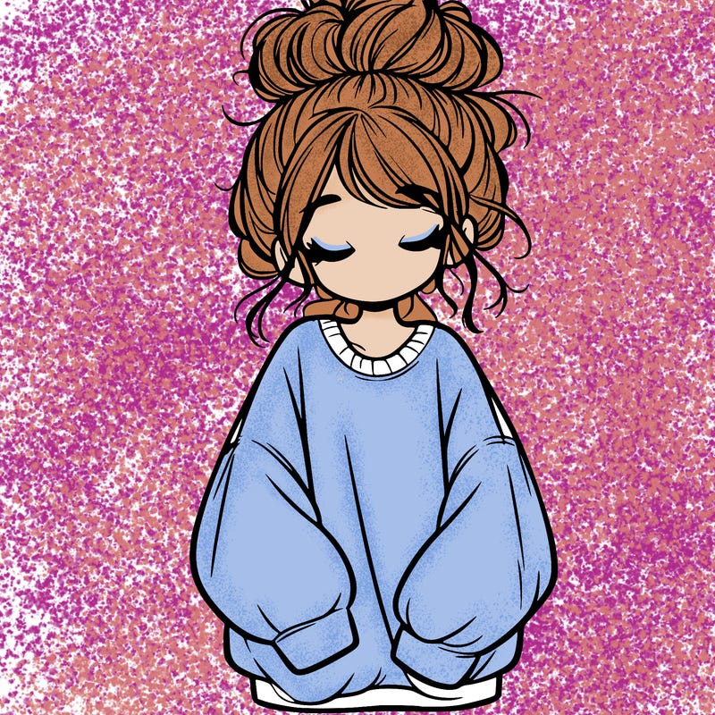 girl with baggy sweatshirt and messy bun