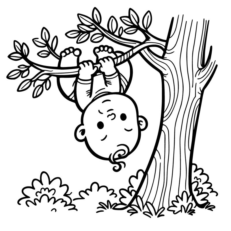 a baby hanging upside down from a tree