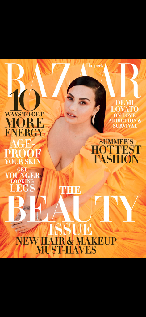 Harper's BAZAAR magazine cover with Demi Lovato in an orange ruffled dress