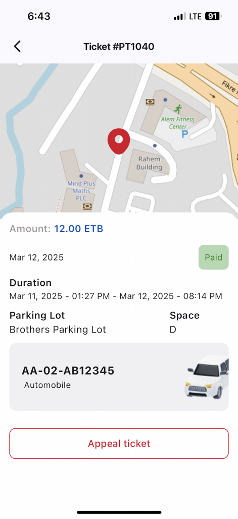 Captura de pantalla de un resumen de multa de estacionamiento en la aplicación AATMA Drivers que muestra un mapa de ubicación y el estado del pago.