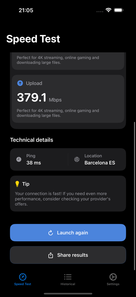 スピードテストアプリのインターフェース。ダーク背景にアップロード速度379.1 Mbps、Ping 38 msが表示されています。