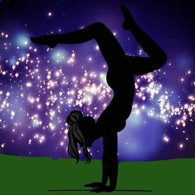 a woman doing a handstand