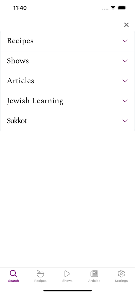 Kosher.com - Kosher.com app navigation menu displaying categories like Recipes, Shows, Articles, Jewish Learning, and Sukkot.