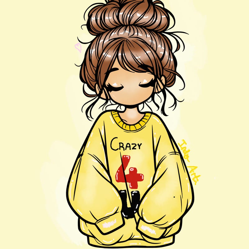 girl with baggy sweatshirt and messy bun
