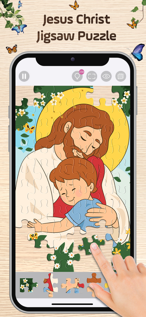 Una persona resolviendo un rompecabezas digital de Jesucristo abrazando a un niño en la aplicación Bible Puzzles.