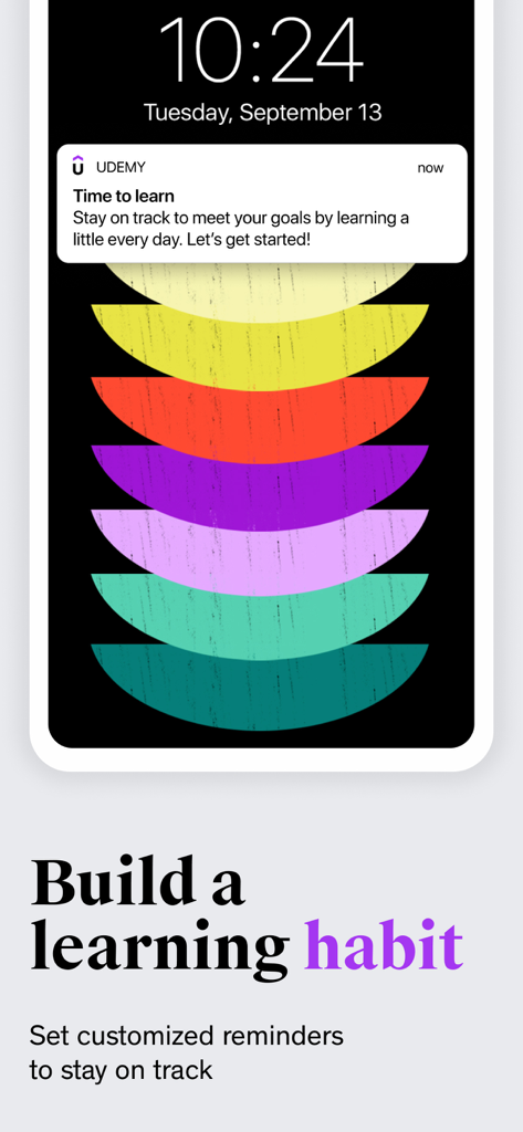 Udemy Online Video Courses - Udemy App Push-Benachrichtigung auf einem Smartphone, die tägliche Lerneinheiten fördert.