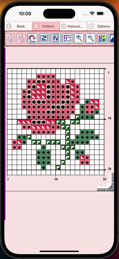 Cross Stitch Pattern Creator app interface showing a rose flower design on a numbered grid with symbols