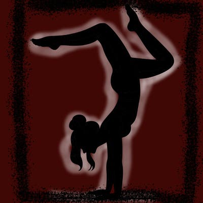 a woman doing a handstand