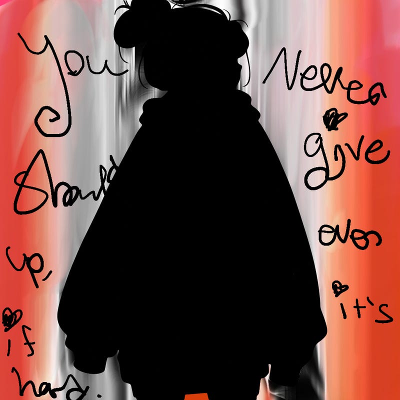 realistic girl with a oversized sweatshirt on and a bun