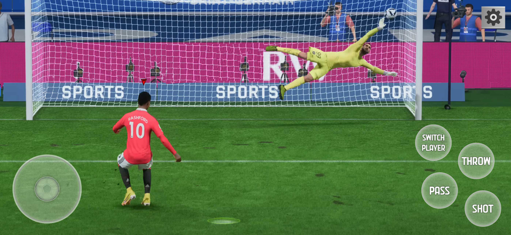 Play Football Games 2025 Goals - Un jugador de fútbol tirando a puerta con un portero lanzándose en un juego de fútbol móvil