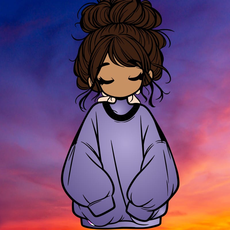 girl with baggy sweatshirt and messy bun