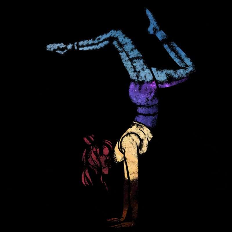 a woman doing a handstand