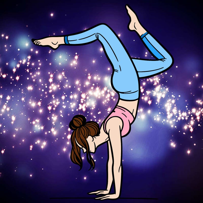 a woman doing a handstand