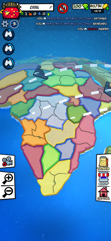Country Balls: Battle World - Écran de jeu de Country Balls Battle World montrant une carte 3D de l'Afrique avec divers territoires colorés.