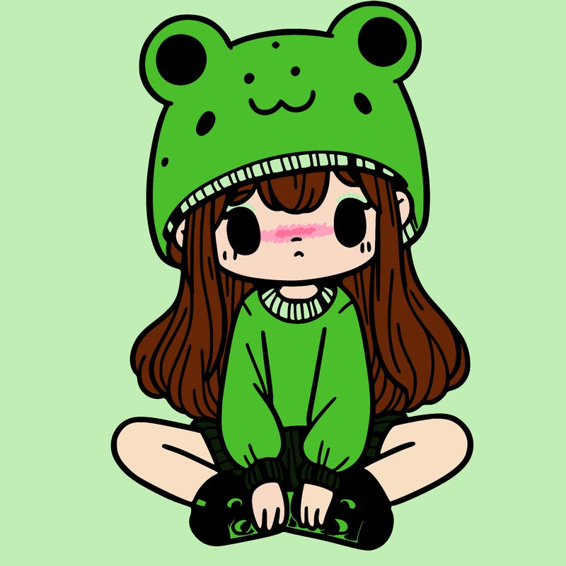 a girl wearing a frog hat and some frog socks