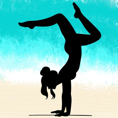 a woman doing a handstand