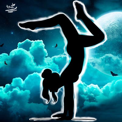 a woman doing a handstand