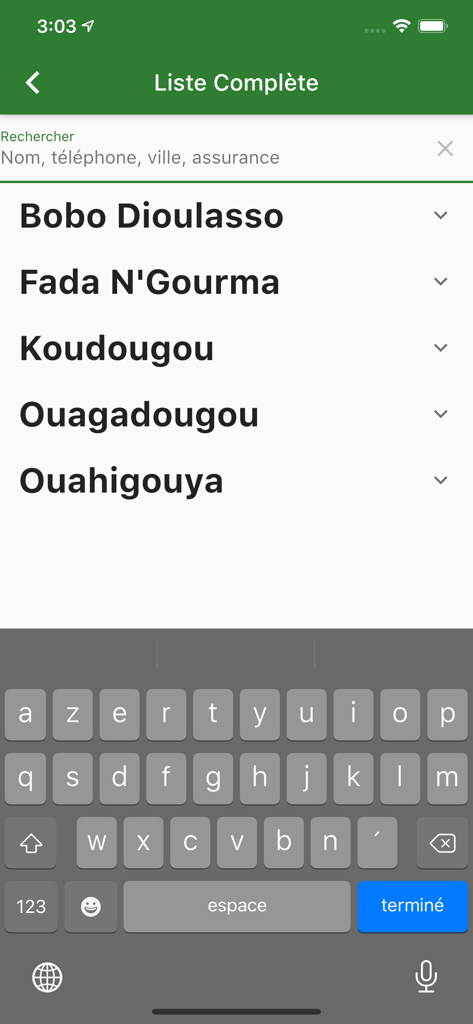 Faso Sante mobile app interface showing a list of cities in Burkina Faso with a search bar and keyboard for finding health facilities