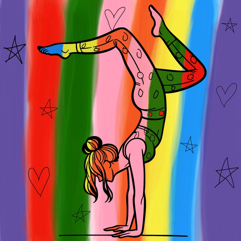 a woman doing a handstand