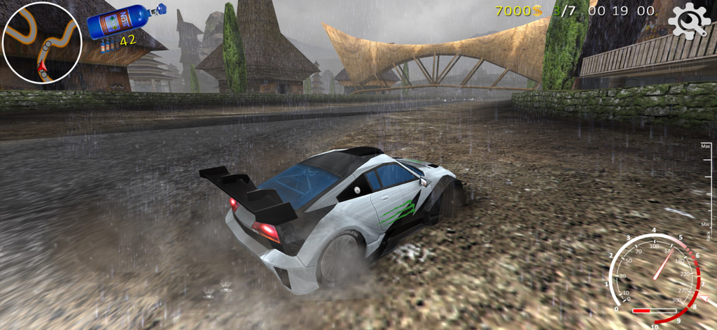 XTrem Racing - A white SuperCar racing on a muddy track in the rain with traditional buildings and a bridge in the background