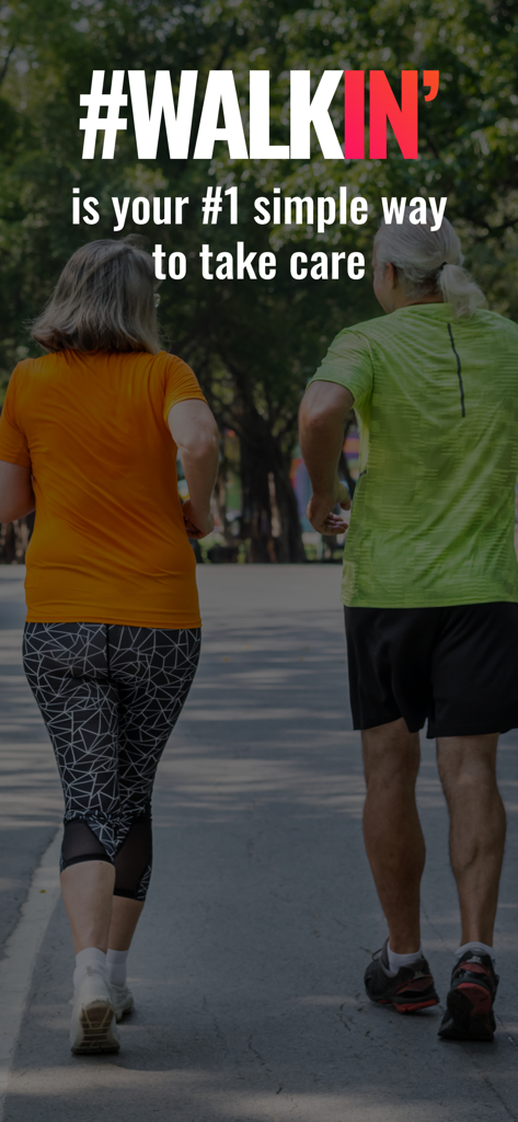 A middle aged man and woman walking in a park to improve their health and wellness