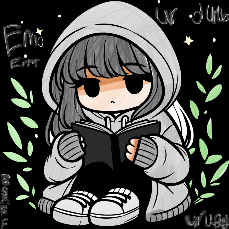 girl in oversized hoodie reading a book