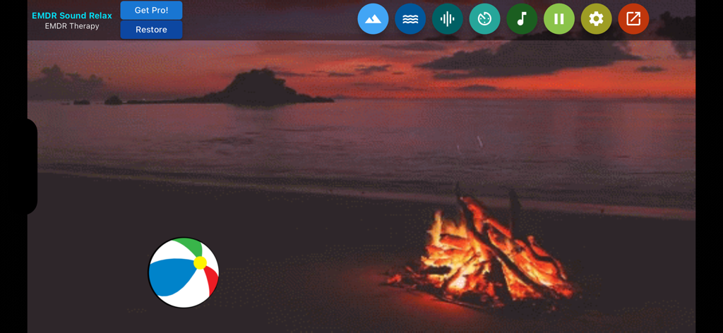 Interface of the EMDR Sound Relax app showing a beach ball and a campfire on a beach at sunset.
