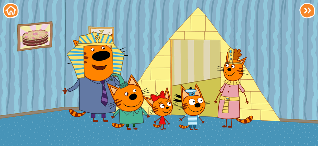 The Kid-E-Cats characters dressed in ancient Egyptian costumes in a playroom with a yellow pyramid