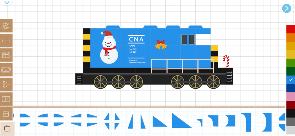 Labo Christmas Train:Kids Game - A digital train building interface featuring a blue locomotive decorated with a snowman and Christmas bells