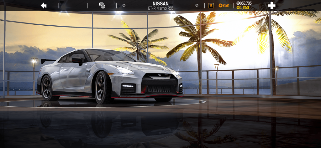 Nitro Nation: Drag Racing - A white Nissan GT-R Nismo R35 displayed in a luxury showroom with a tropical sunset background