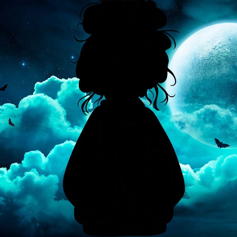 girl with baggy sweatshirt and messy bun