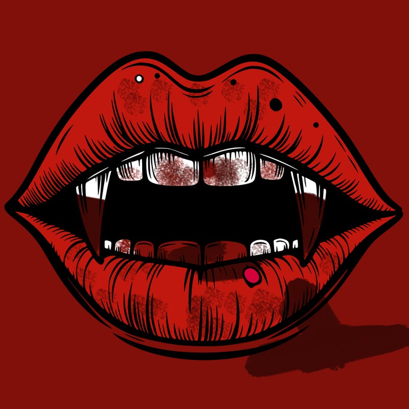 lips with vampire teeth