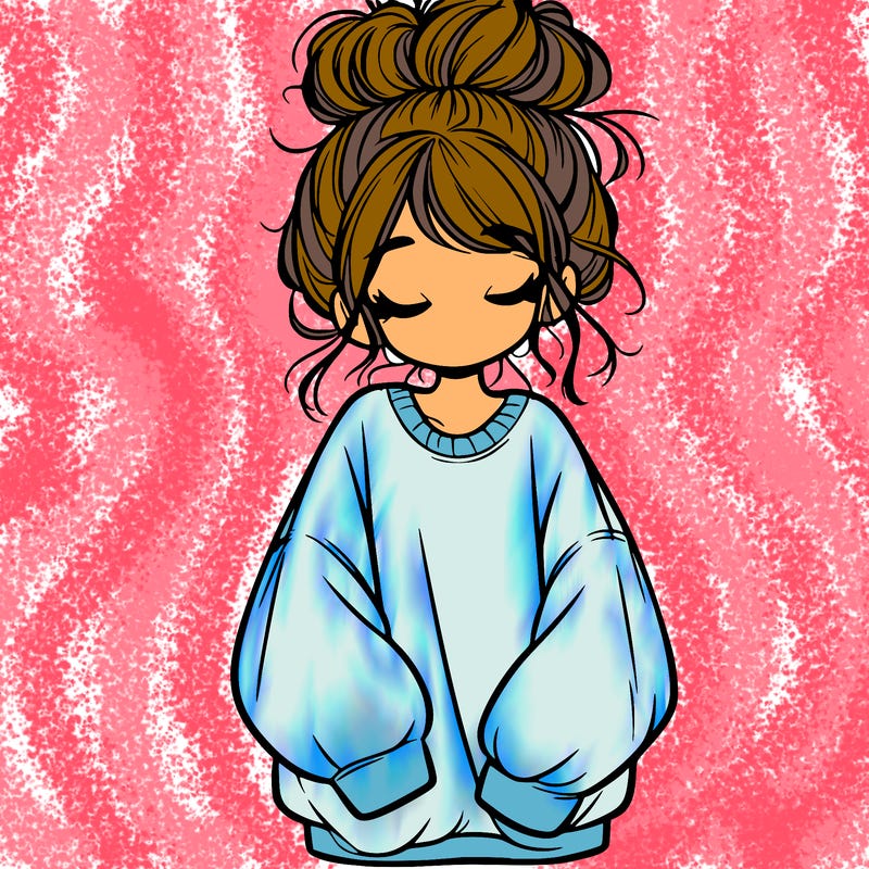 girl with baggy sweatshirt and messy bun