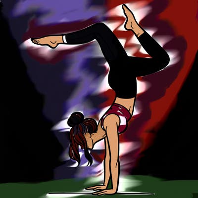 a woman doing a handstand