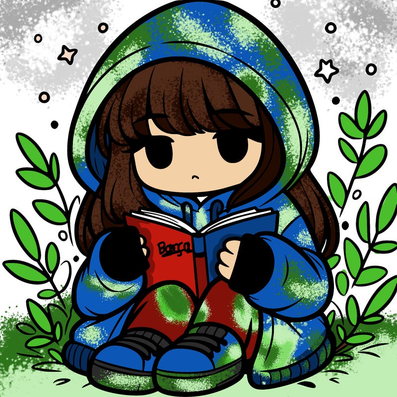 girl in oversized hoodie reading a book