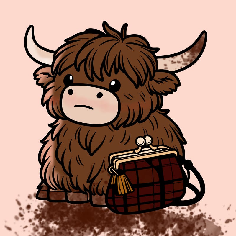 highland cow in a purse