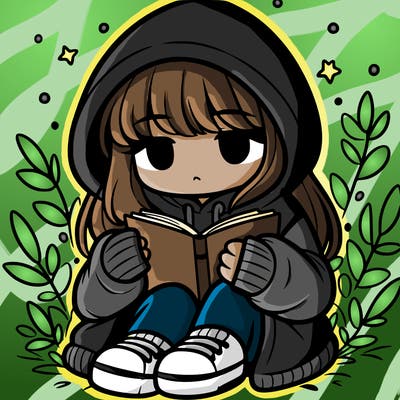 girl in oversized hoodie reading a book