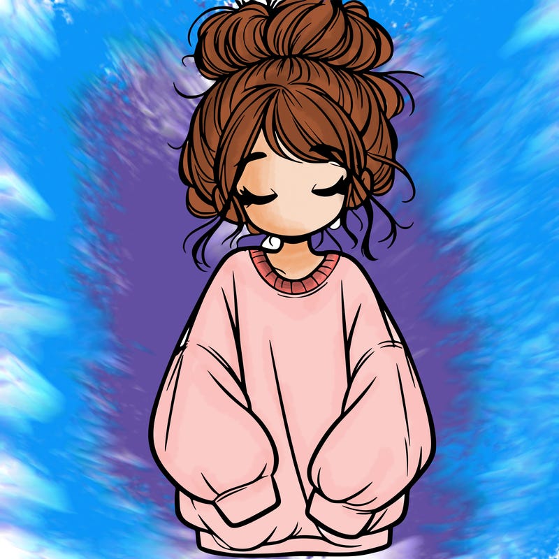 girl with baggy sweatshirt and messy bun