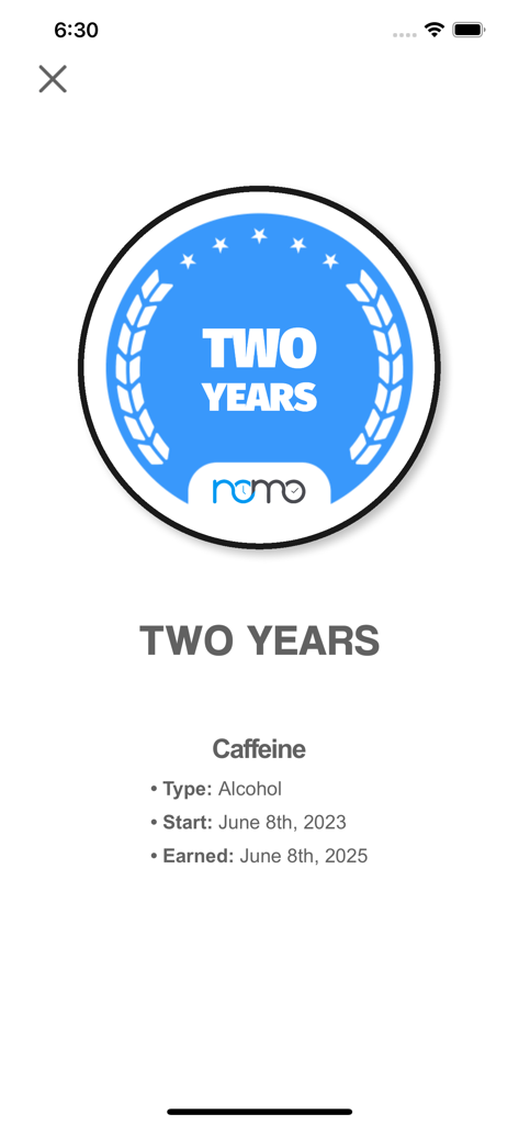 Nomo -  Sobriety Clocks - A blue digital sobriety chip from the Nomo app celebrating a two year milestone for caffeine