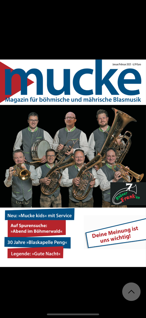 Mucke - Cover of Mucke magazine featuring a traditional German brass band with instruments