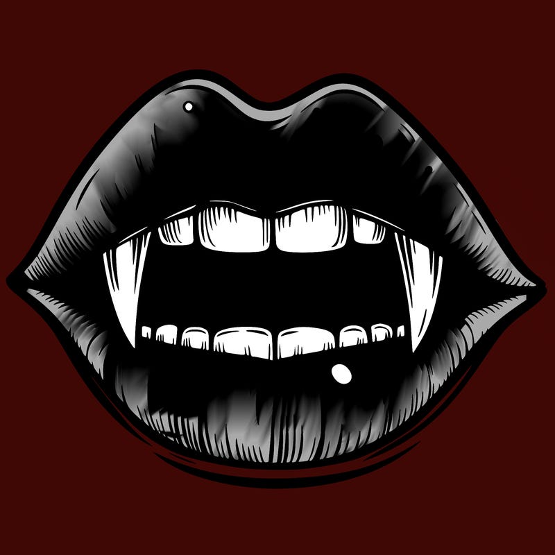 lips with vampire teeth